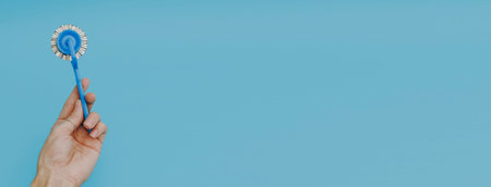 Girl holding a ravioli knife, blue bannerの写真素材