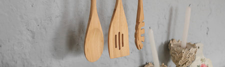 Banner with wooden cooking spoons