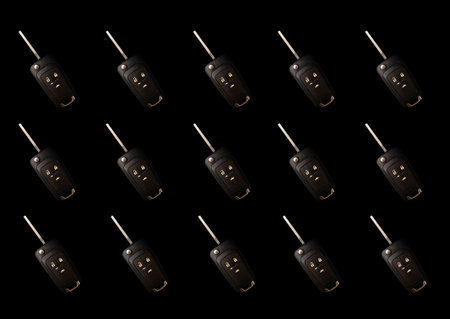Car keys on black background, monochrome, collage