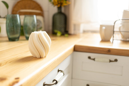 Woven wax candle stands in the kitchen interior