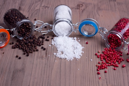 Three type of spices on a wooden backgroundの写真素材