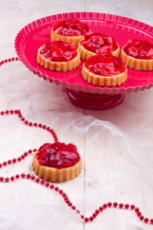 Strawberry tartalets on a tableの写真素材