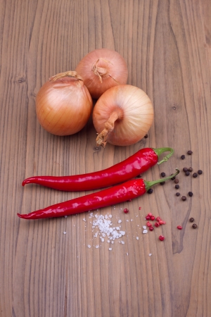 Onions with chilli on a tableの写真素材
