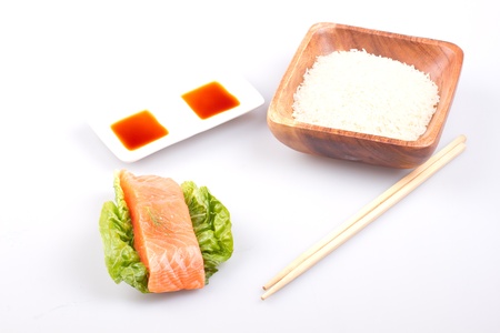 Salmon with rice on a white backgroundの写真素材