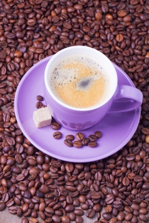 A cup of coffee with coffee beans, selective focusの写真素材