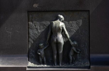 Oslo Norway - 22 june 2019: Relief of woman and two kids on wall of the Fountain in Vigeland Parkのeditorial素材