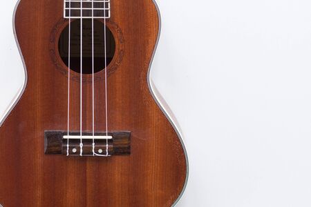 Body of ukulele on white backgroundの写真素材