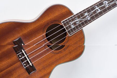 Body of ukulele on white background