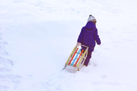 Child carrying sleigh