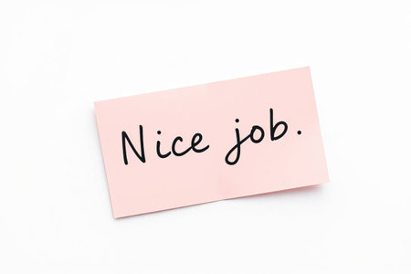 Text Nice job on pink note on white backgroundの素材