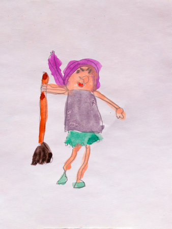 A colorful child's drawing of a witch holding a broom, wearing a purple scarf and a green skirt. The drawing is created with watercolor and felt-tip pens on a white background.の写真素材