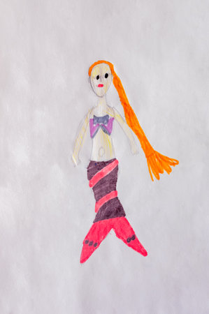 Mermaid on white paper made by child using felt tip pens or markers in childlike styleの写真素材