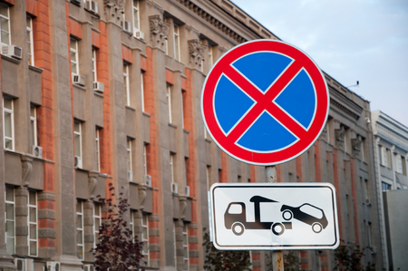 Street sign 'Stop and parking prohibited' on the background of beautiful buildingの写真素材