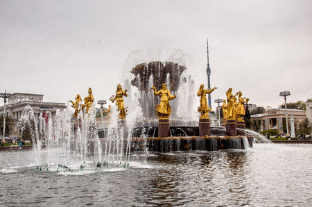 Moscow - May 5, 2017: a Friendship of the People waterworks in the VDNKh complex with Ostankino tower on the backgroundのeditorial素材