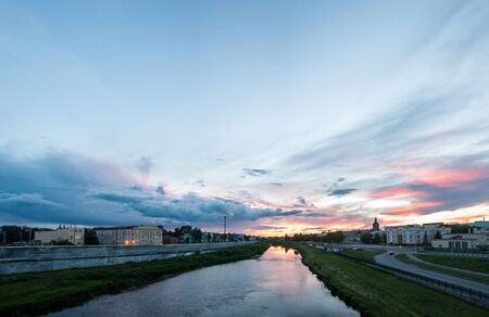 A panoramic view at Upa river and beautiful sunset in the center of russian town Tulaの写真素材