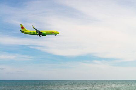 Larnaca, Cyprus - March 2, 2018: landing S7 company airplane in the Larnaca international airport placed on the sea coastのeditorial素材