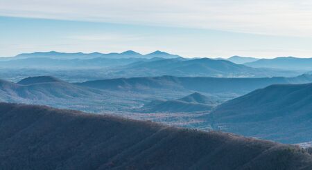 Appalachian mountain ranges in Virginia, USA, on sunrise. Mountains are covered with treesの写真素材