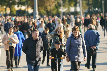 Moscow, Russia - September 10, 2022: Street photography. People walk in the city park in the day. lifestyle concept. A lot of people. high angle viewのeditorial素材