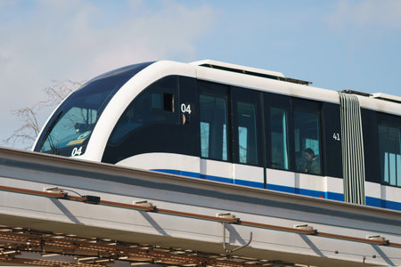 Moscow, Russia - March 28, 2023: Moscow Monorail in high near the  Exhibition of Achievements of National Economy (VDNKh) in sunny summer day. Public transportation themeのeditorial素材