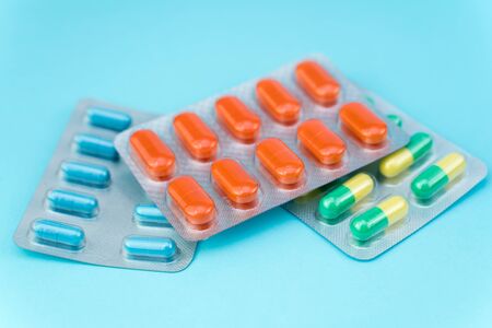 blisters with pills on a blue backgroundの写真素材