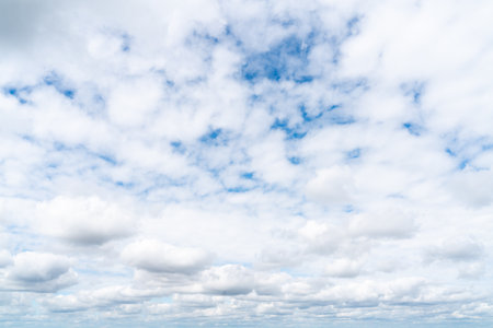 blue sky background with white cloudsの写真素材