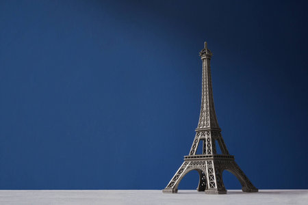 Souvenir Eiffel Tower on a blue backgroundの写真素材