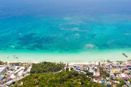 Houses and streets on the island of Boracay, Philippines, top view. Hotels and buildings on the big...