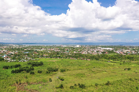 Tacloban city, Leyte island, Philippines. Tropical landscape with panorama of the town, aerial view....