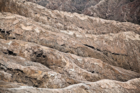 Solidified lava texture. Hills of volcanic origin. Abstract natural background. Surface of the earth...
