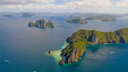 Islands with rocky shores. Group of tropical islands, Philippine nature. El Nido, Palawan,...
