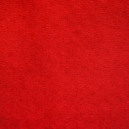 abstract red background or Christmas paper texture. bright red paper backgroundの写真素材