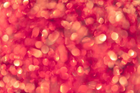 abstract red defocused lights background. bokeh abstract background and texture. Blurred glitters