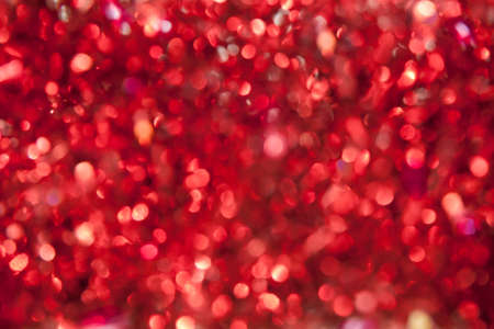 abstract red defocused lights background. bokeh abstract background and texture. Blurred glitters