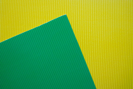 Light flat lay background with color crepe paper sheets.の写真素材