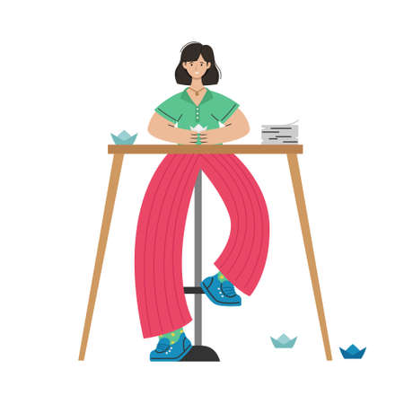 A girl makes origami out of paper at the table. Creative activity.のイラスト素材