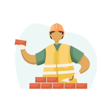 Vector illustration of a male builder in a helmet laying a brick. flat styleのイラスト素材