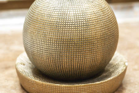 abstract background with small texture of metallic golden ball close up, beauty conceptの写真素材