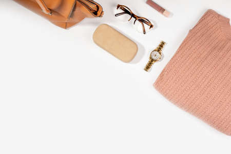 set of fashionable womens accessories on a white background with a place for text. Leather bag,...