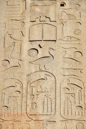 Egyptian hieroglyphs on the obelisk in front of St. John in Lateran Church in Romeの写真素材