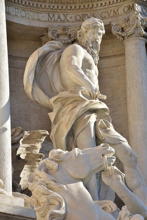 Neptune (Ocean), the main statue of the Trevi Fountain in Rome, by architect Nicola Salvi with winged horseの写真素材