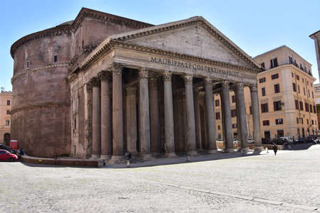 Full view of Pantheon, in a desert Rotonda Square without tourists due to the restrictions for Coronavirus pandemic in Romeの写真素材