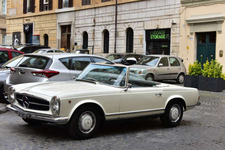 ROME, ITALY, MAY 9, 2020: Vintage luxury Mercedes Benz 280 SL cabriolet 1968, in Trastevere district, Romeのeditorial素材