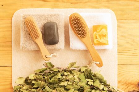 Set for a bath for a couple. Two towels, soap and body brushes. Vacation together. Pleasant warm...
