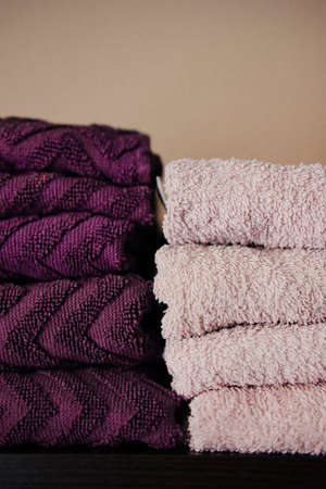 Stack of bath towels on a shelf in a barbershop close upの写真素材