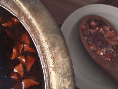 Golden jam in a golden bowlの写真素材