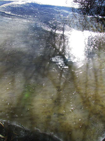 Melting ice on the riverの写真素材
