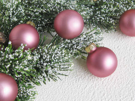 Merry Christmas and Happy Winter Holiday. Christmas decorations pine cones and branches, and Christmas balls on a light background. View from aboveの写真素材