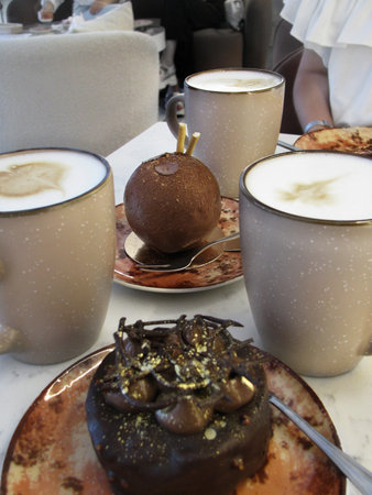 Chocolate cakes with decorations and coffeeの写真素材