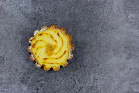 delicious curd cake on a gray background. View from above