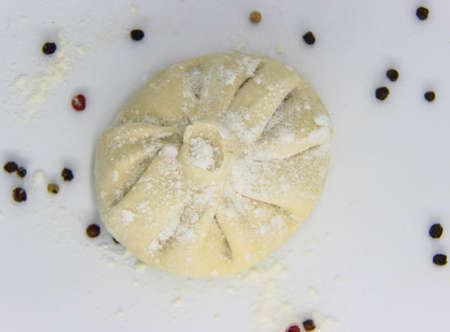 Single uncooked khinkali on white, georgian foodの写真素材